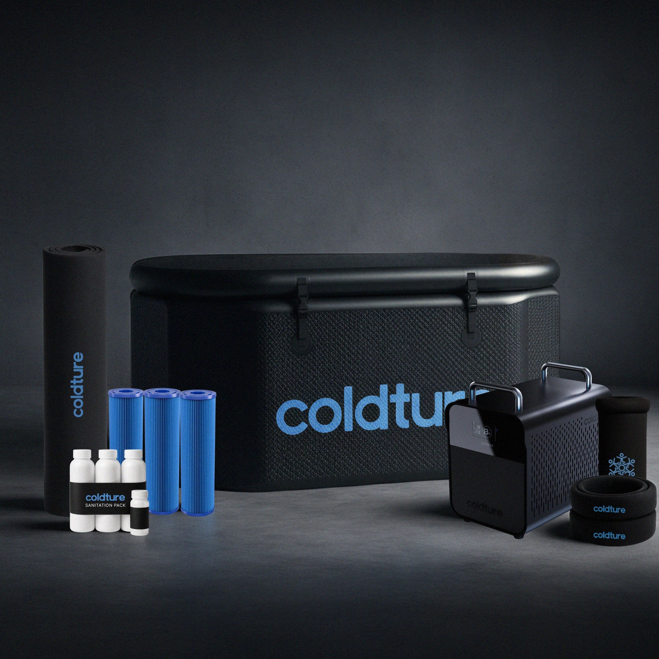 Coldture product set including a cooler box, insulated bags, and bottles on a dark background
