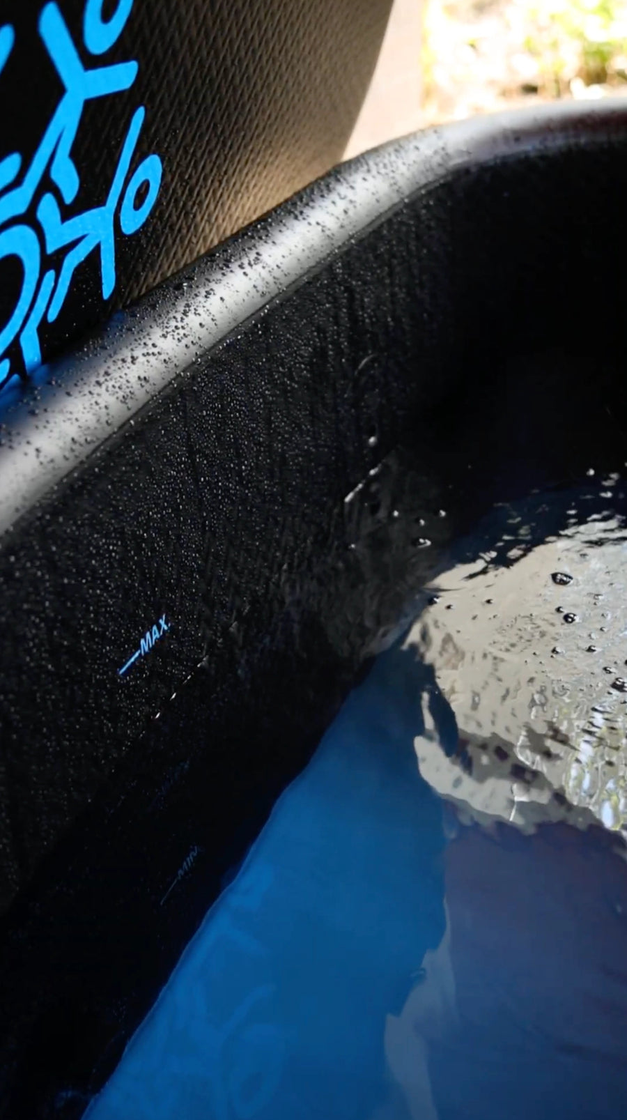 close-up of a Coldture cold plunge shell and chilled water surface